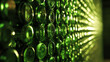 © Nicat - A visually striking wall of stacked green beer bottles, backlit for an interesting effect.