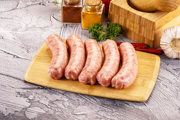 Raw meat sausages for grill