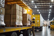 © Patcharaphon - Workers loading boxes into truck. Supply chain, shipment goods shipping warehouse and logistics