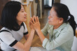 © Timeimage - Asian woman expressing gratitude to her mother