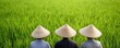 © Jayda_ArtistryHub - Workers in traditional hats harvesting rice by hand in lush green fields, emphasizing cultural heritage and manual labor rice industry, traditional rice farming