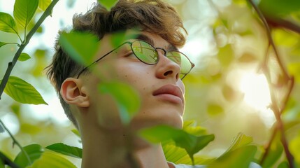 Wall Mural - young man green nature lover 