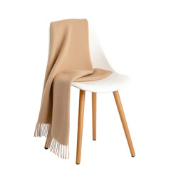 A cozy beige blanket draped elegantly over a modern white chair, perfect for enhancing any living space or decor.