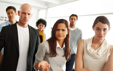 Canvas Print - Meeting, portrait and group of frustrated business people with questions, solidarity and angry protest in office. Workshop, women and men with stress, doubt and confused team at seminar with feedback