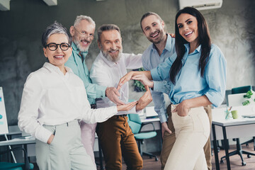 Canvas Print - Photo of teamwork startup partners confident posing people show circle comfortable nice creative startup office loft room interior