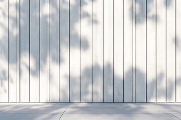 Aufkleber - This image features white modern vertical wall panels, where shadows of external objects create a play of light and shadow, adding depth and artistic flair to the minimalist design.