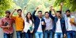 © Reubens Stock Photos - Happy Indian University Students Cheering Together on Campus Outdoors