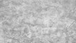 © WONGSAKORN - grunge grey stucco cement texture background, natural matt concrete texture for interior or exterior home decoration. rustic facade surface for design. modern grey limestone texture.