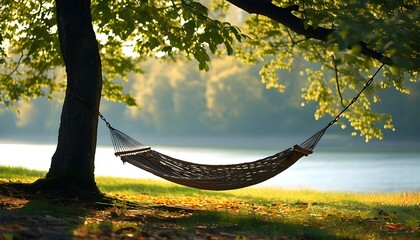 Wall Mural - Tranquil hammock under a shady tree invites relaxation and peacefulness