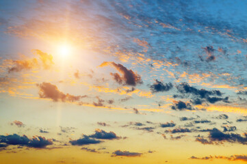 Sticker - Sunrise sky with lighted clouds.