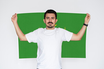 Moustached man holding Mauritania flag, independence or celebration day idea, campaigning concept