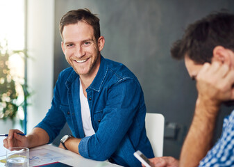 Canvas Print - Creative, workshop and portrait of man in office with smile, confidence and collaboration in meeting. Teamwork, design and business people in conference room with job, career pride and opportunity