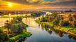 © Achiraya - Serene golden light bathes the majestic Nile River Delta, where lush green vegetation and tranquil waterways converge in Egypt's ancient fertile crescent.