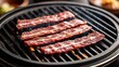 © Steveandfriend - Closeup of thin slices of beef cooking on a Korean BBQ grill