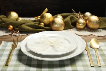 Poster - Plates, cutlery and Christmas decor on wooden table