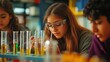 © BerkahStock - Students conducting experiments in a science lab with test tubes and safety gear.