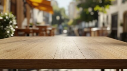 Wall Mural - A wooden table in a cafe setting with a blurred street view in the background.