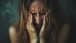 © Khmel - Emotional woman expressing distress and pain in a dimly lit room