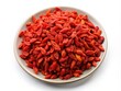 © Noppakun - Dried Goji Berries Piled on White Plate