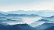 © neirfy - Ethereal blue mountain peaks enveloped in a soft, misty fog at dawn.