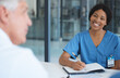 © peopleimages.com - Medical, team and woman with writing in meeting for healthcare planning, health management or discussion. Doctor, nurse collaboration and people in boardroom for diagnosis treatment and cardiology