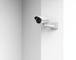 © thien - Modern CCTV camera mounted on corner of smooth white wall, providing security and surveillance. Its sleek design enhances aesthetic while ensuring safety