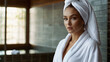 © Dorota - beautiful young woman wearing a white towel on her head and a white bathrobe in a modern luxurious spa