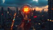 © Jirakit - Light bulb held up against a city skyline at sunset, symbolizing inspiration and innovation.