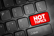 © dizain - Hot Topics text button on keyboard, concept background