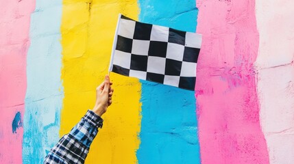 Wall Mural - flag in hand with black and white checkered pattern fluttering in the wind on a clean white backgrou