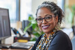© AI_images_for_people - A senior African American female customer support representative with a contented smile, looking at the camera while seated at her desk in a cozy office.