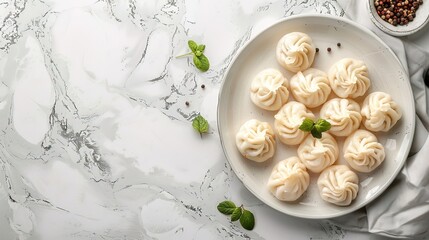 Cuisine traditional dumplings on white stone viewed from the top with space for text 