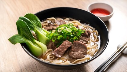 Wall Mural - Delicious Beef Noodle Soup with Bok Choy and Green Onions