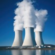 © diowcnx - Industrial Energy Hubs: Nuclear Power Plants Over Waterfront with Clear Sky.