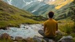 © STGZ. - A man practicing mindfulness while sitting by a mountain stream for mental clarity