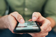 © Frank Coop/peopleimages.com - Man, hands and typing with phone screen for online browsing, communication or social media. Closeup, male person or user scrolling with mobile smartphone on website or app for texting or research