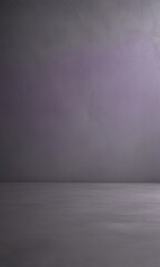 A simple, minimalist image of a gray concrete floor with a dark purple wall in the background.