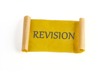 Canvas Print - REVISION written on paper, a mustard-colored note on a white background