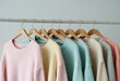 © Алексей Ковалев - A vibrant array of colorful sweaters beautifully hanging on a rack