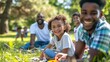 © Mymo.onlit - A family is having a picnic in a park, with smiling children and parents
