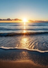 A beautiful sunset over the ocean with a foamy wave lapping at the shore.