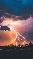 Canvas Print - Lightning strikes through a dramatic sky, illuminating the landscape.