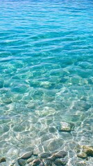 Canvas Print - Crystal clear turquoise water with visible rocks below the surface.