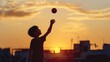 © Pixora Labs - Silhouette of a boy catching a ball on a sunset background