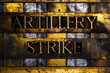 © IHX - Artillery Strike text in real authentic typeset letters on vintage textured silver grunge copper and gold background