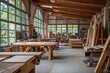 © Gatherina - Large woodworking shop with nobody in sight showing tools and lumber