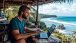 © vetrana - Man working on laptop by the beach, embracing the freedom of remote work flexibility
