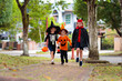 © famveldman - Kids trick or treat. Halloween fun for children.