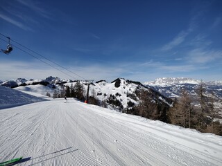 skiing in the mountains