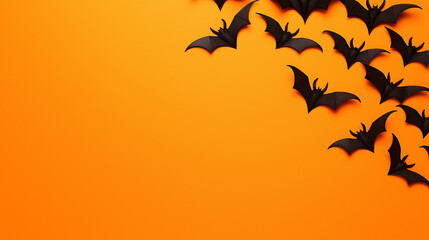 Wall Mural - Black bats arranged on bright orange background for Halloween decor
